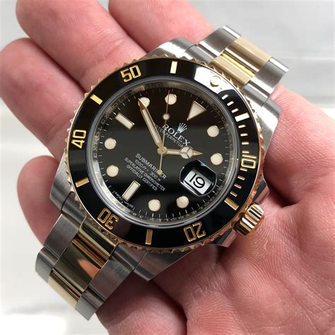 gold stainless submariner rolex black|Rolex Submariner 126613lb for sale.